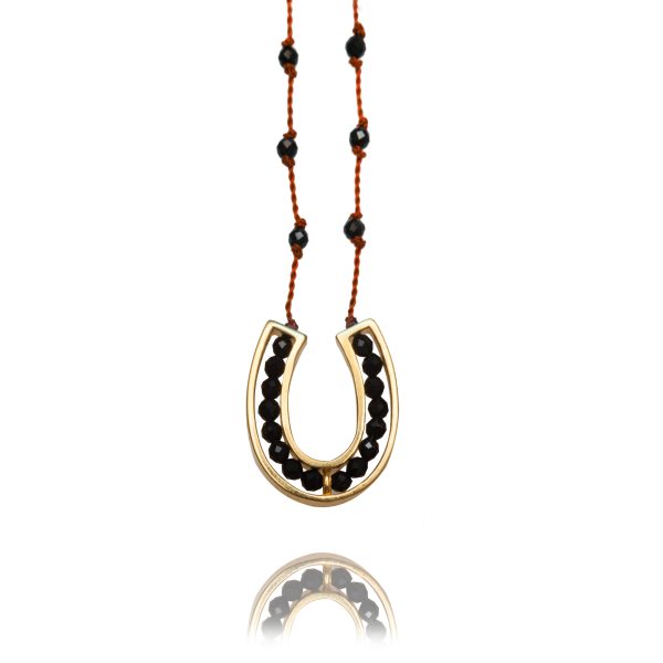 830-yellow gold-horseshoe-spinel-red cord-42